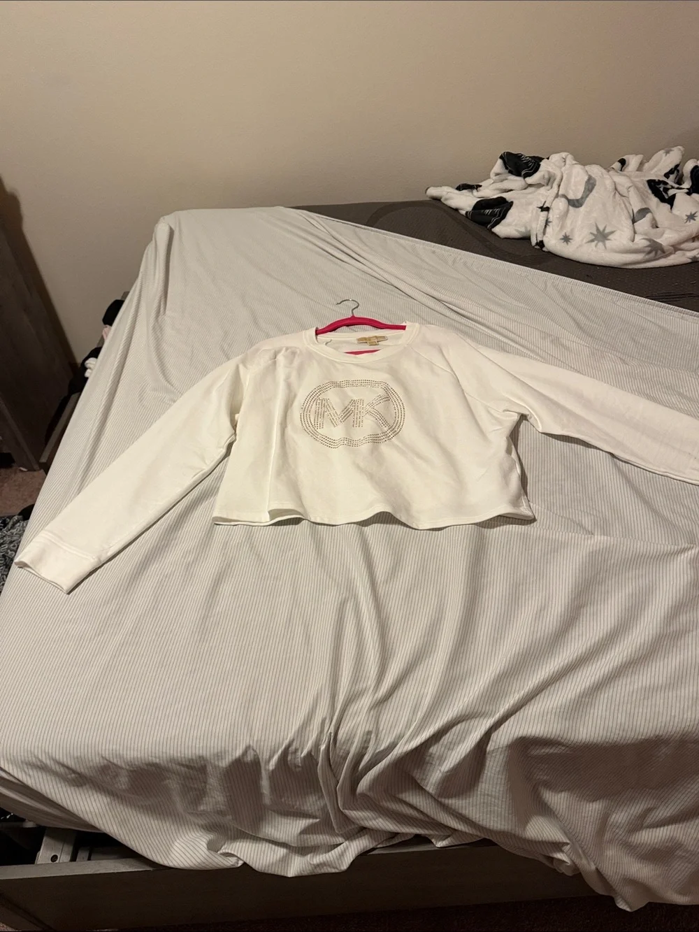 Michael Kors sweater mix crop top at the bottom of it